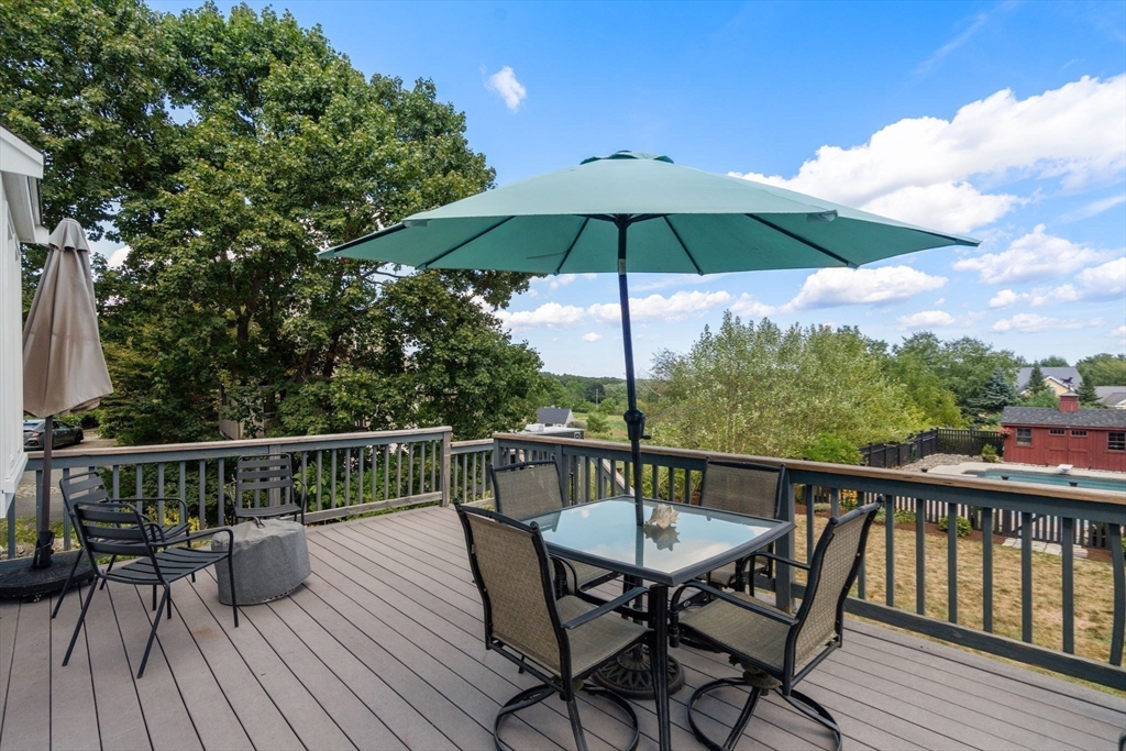 19 Main Street Dover, MA 02030 - Photo 28 of 41 a view of balcony with furniture and wooden deck
