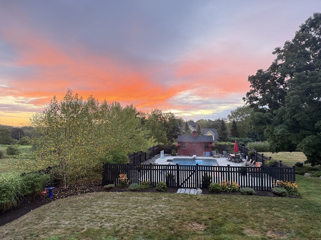 19 Main Street Dover, MA 02030 - Photo 39 of 41 a view of a chairs and table in the patio