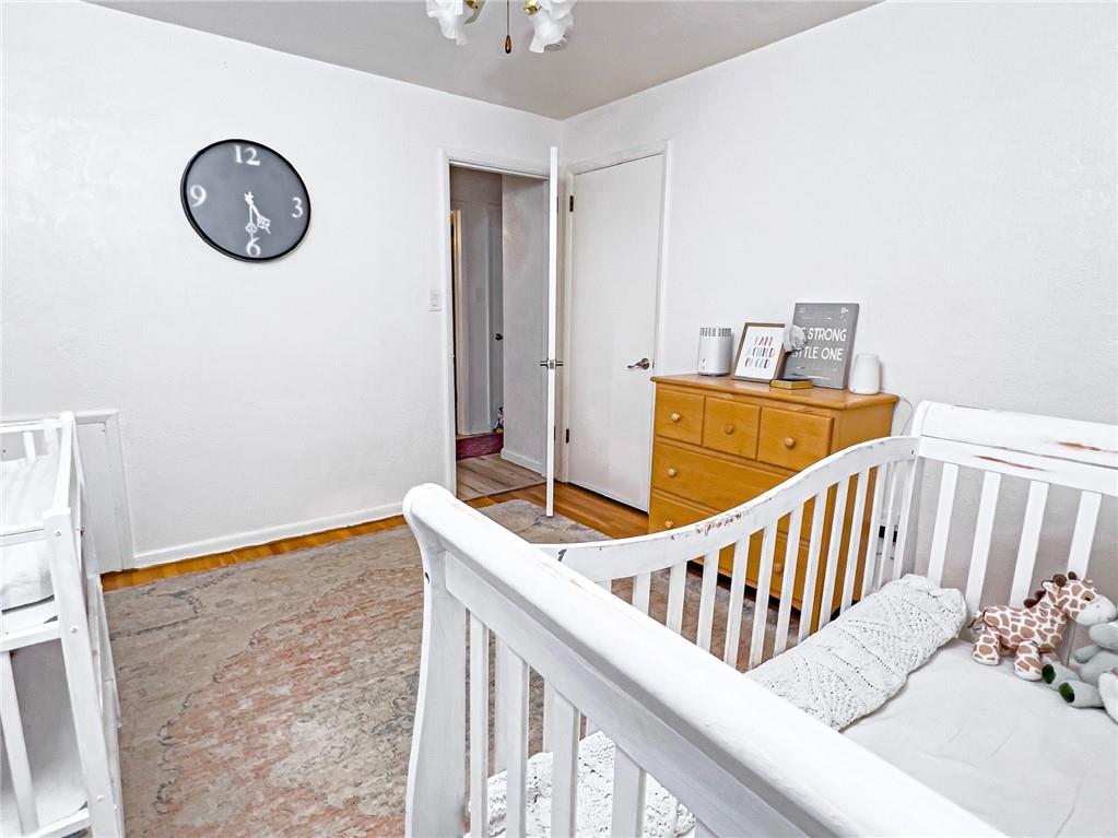 411 Colonial Drive Monroeville, PA 15146 - Photo 19 of 39 a view of a hallway with wooden floor