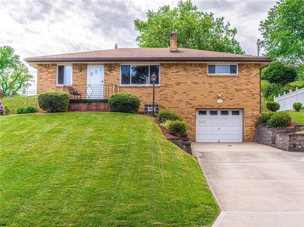 411 Colonial Drive Monroeville, PA 15146 - Photo 2 of 39 a view of a house with a yard and potted plants