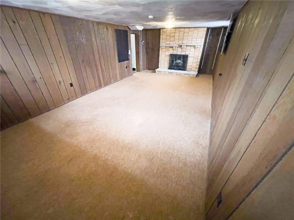 411 Colonial Drive Monroeville, PA 15146 - Photo 26 of 39 a view of a bedroom with wooden floor and a fireplace