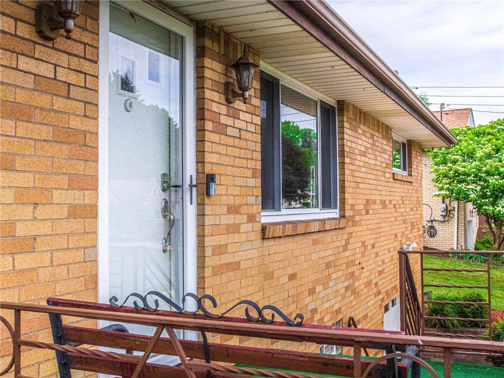 411 Colonial Drive Monroeville, PA 15146 - Photo 5 of 39 a view of front door and potted plants