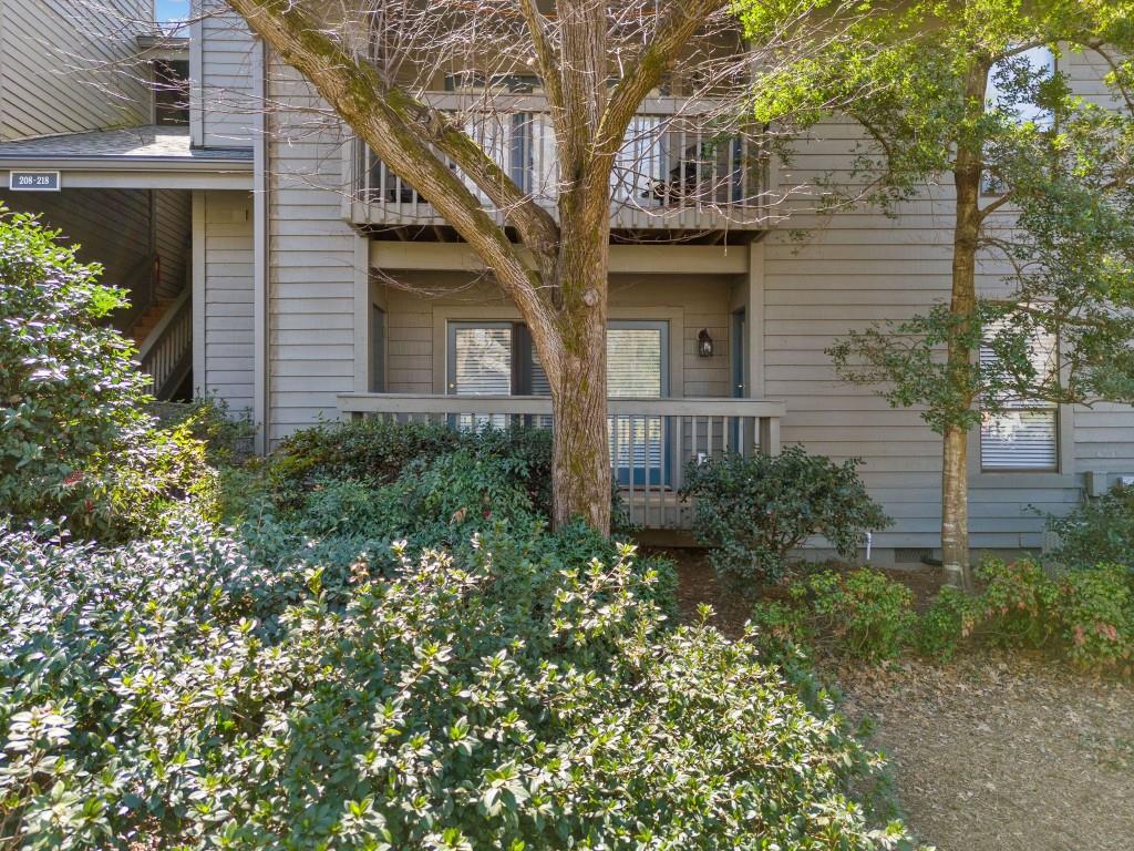 213 Tuxworth Circle Decatur, GA 30033 - Photo 1 of 1 a front view of a house with garden