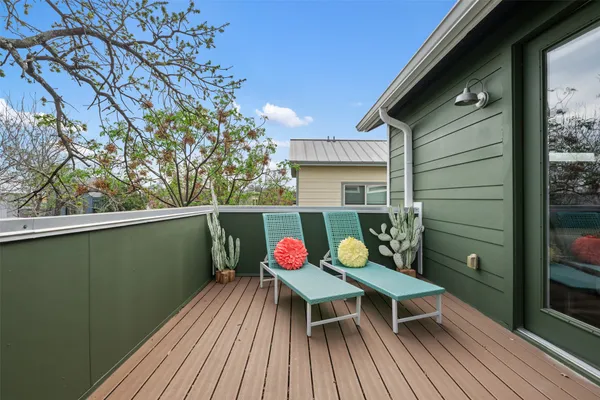 a view of a chairs in a balcony