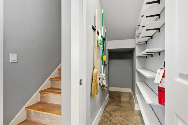 a view of a backyard with pathway