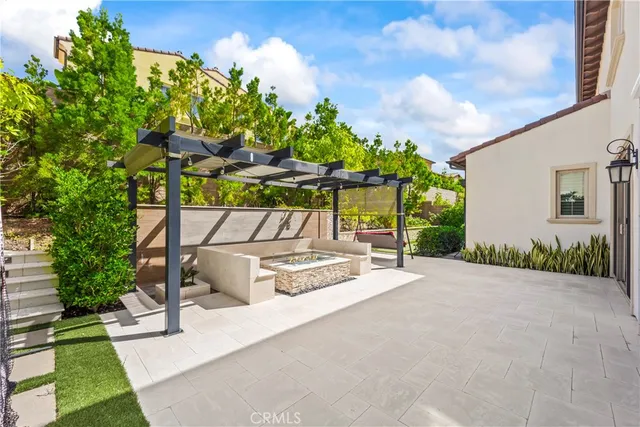 an outdoor space with seating and a patio