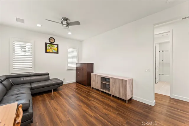 a bathroom with a bathtub and a toilet