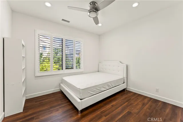 a spacious bathroom with a tub and shower