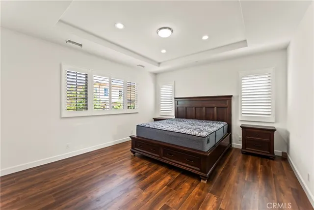 a bathroom with a sink a tub and a mirror
