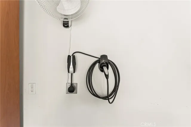 a view of a swimming pool with outdoor seating