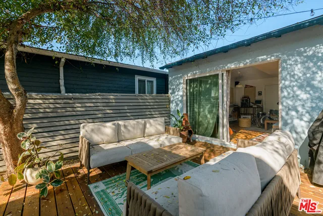 a backyard of a house with seating space