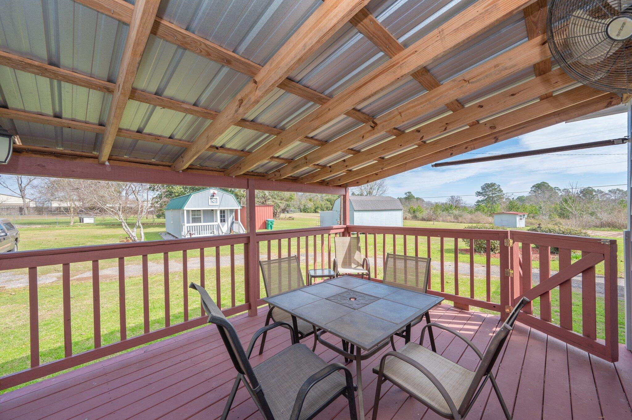2288 Caton Road Florala, AL 36442 - Photo 33 of 47 a view of a balcony with wooden floor