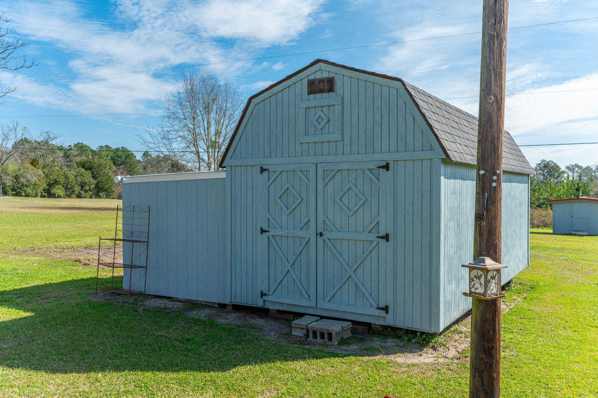 2288 Caton Road Florala, AL 36442 - Photo 41 of 47 a front view of a house with garden
