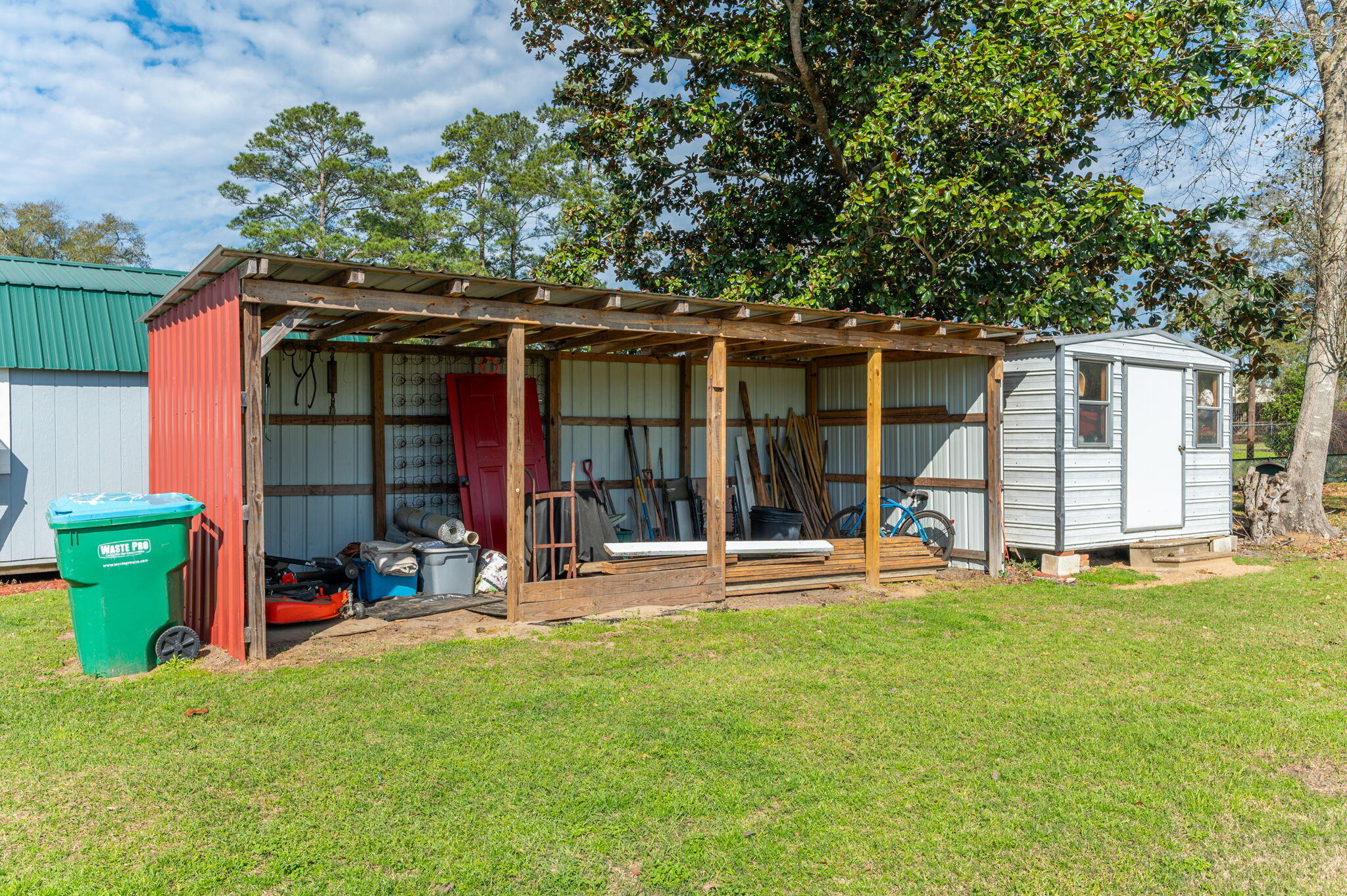 2288 Caton Road Florala, AL 36442 - Photo 42 of 47 a backyard of a house with yard and outdoor seating