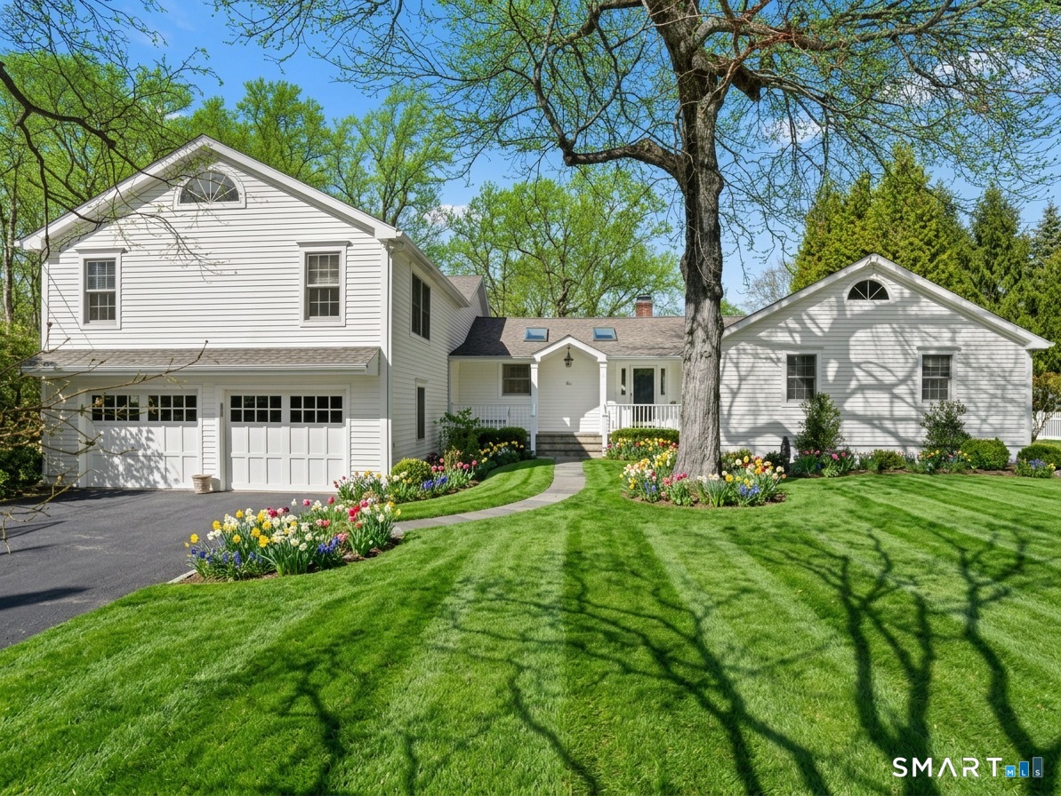 10 Reimer Road Westport, CT 06880 - Photo 1 of 38 a front view of a house with a yard
