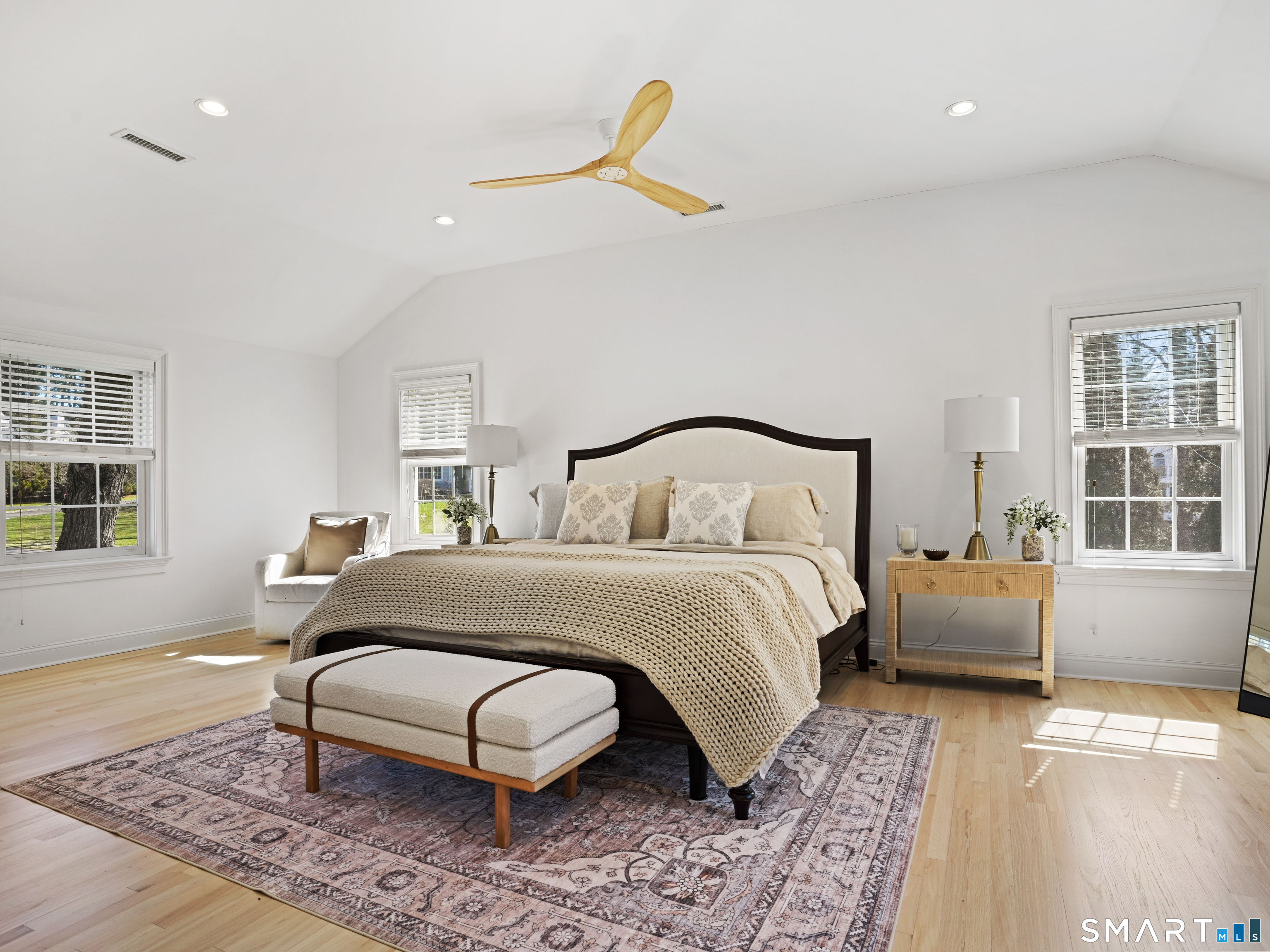 10 Reimer Road Westport, CT 06880 - Photo 12 of 38 a bedroom with a bed and wooden floor