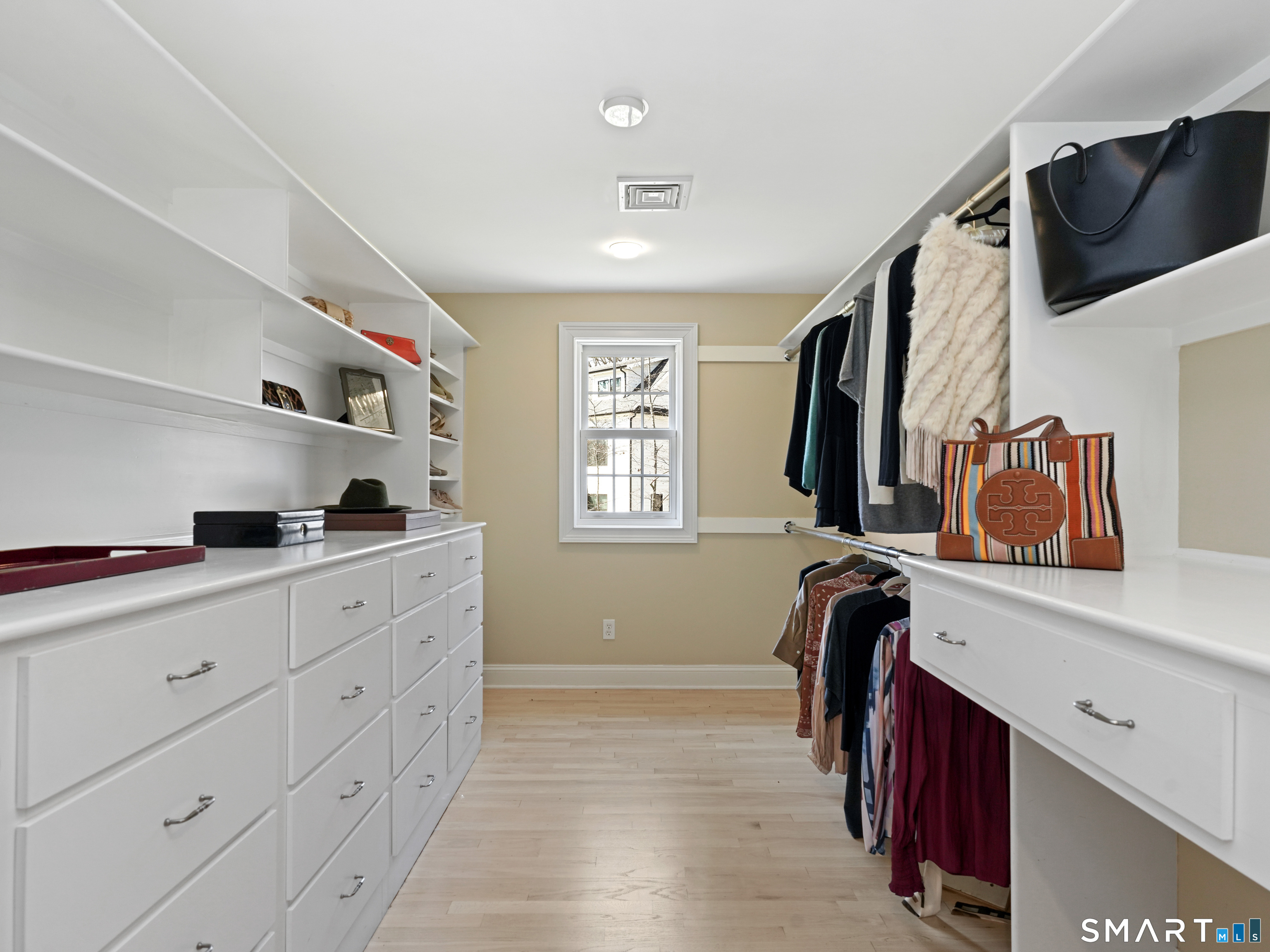 10 Reimer Road Westport, CT 06880 - Photo 14 of 38 a kitchen with cabinets and wooden floor