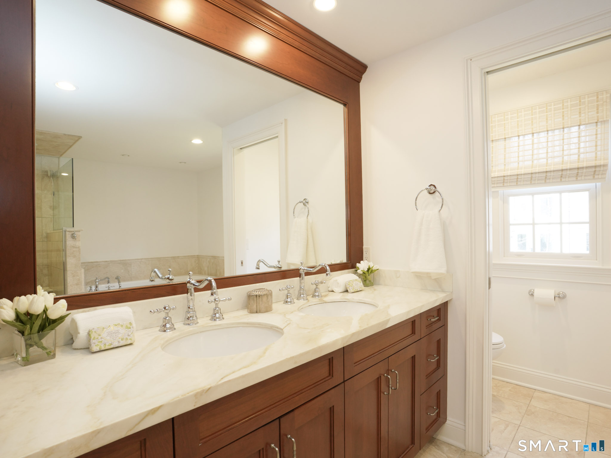 10 Reimer Road Westport, CT 06880 - Photo 16 of 38 a bathroom with a sink and a mirror