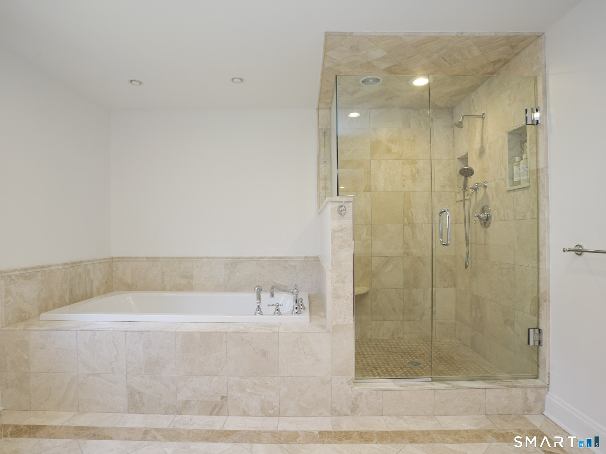 10 Reimer Road Westport, CT 06880 - Photo 17 of 38 a bathroom with a bathtub and a shower