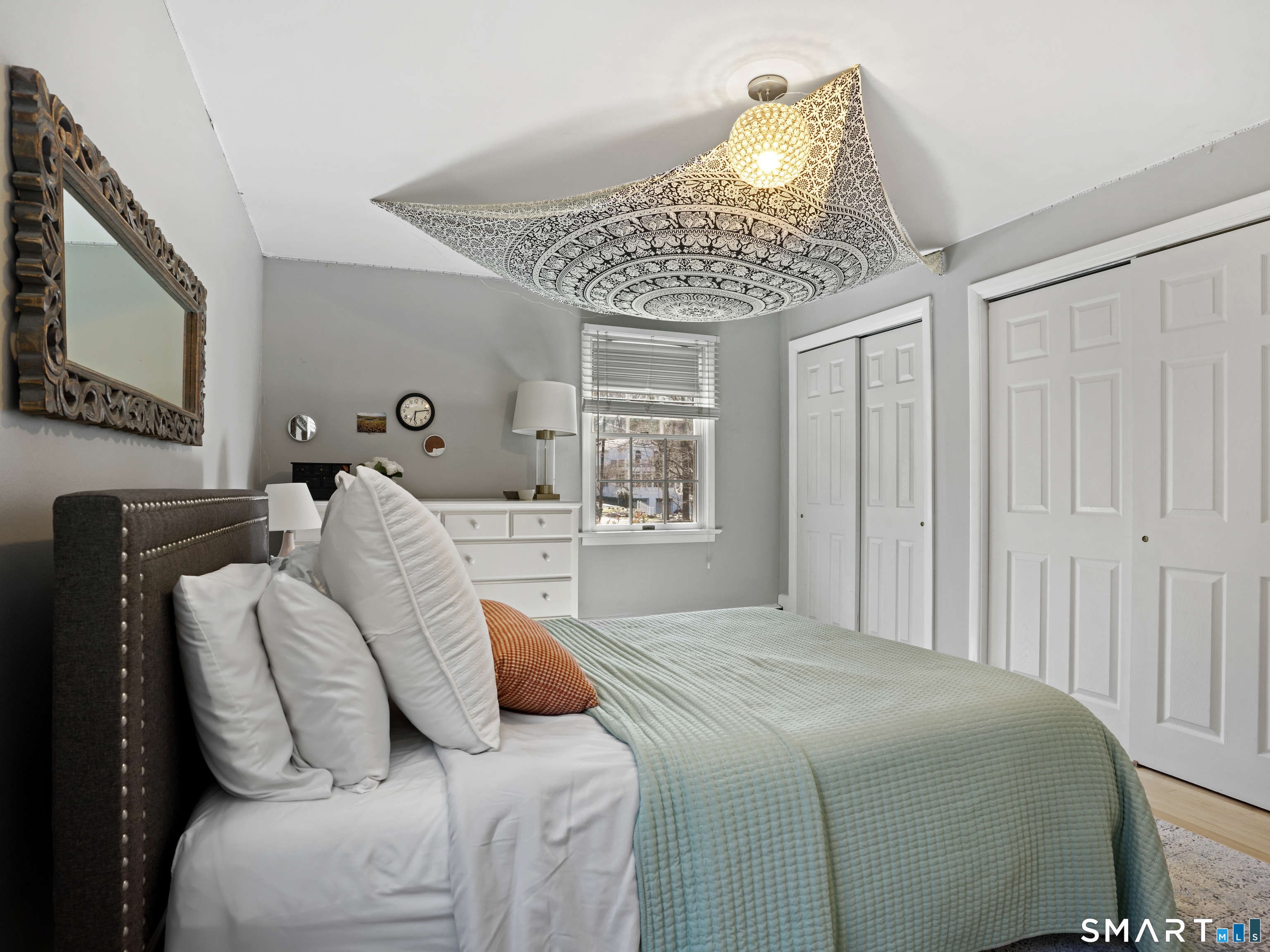 10 Reimer Road Westport, CT 06880 - Photo 20 of 38 a bedroom with a bed and window