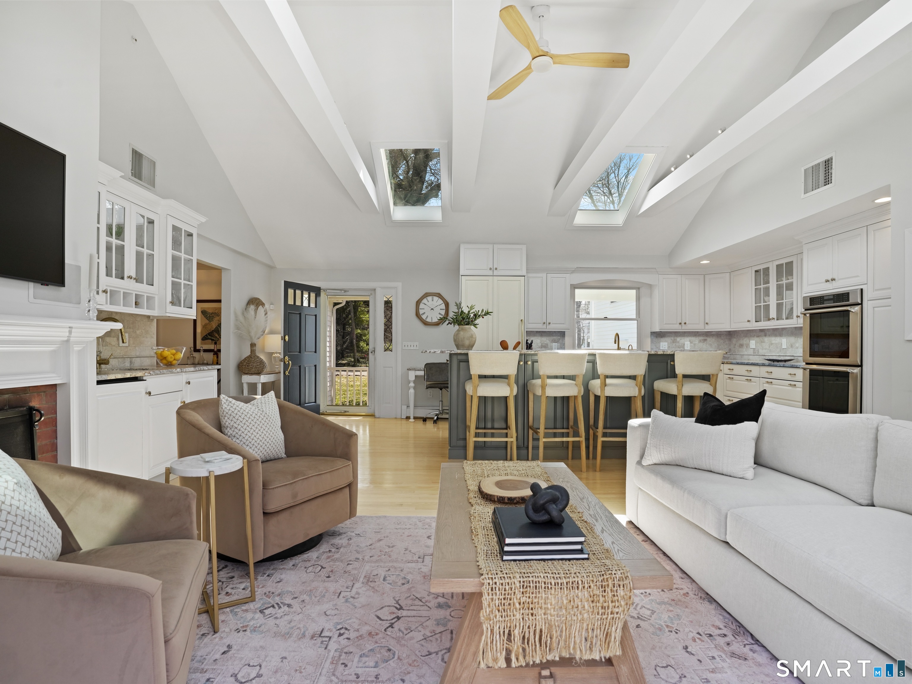 10 Reimer Road Westport, CT 06880 - Photo 2 of 38 a living room with furniture and a fireplace