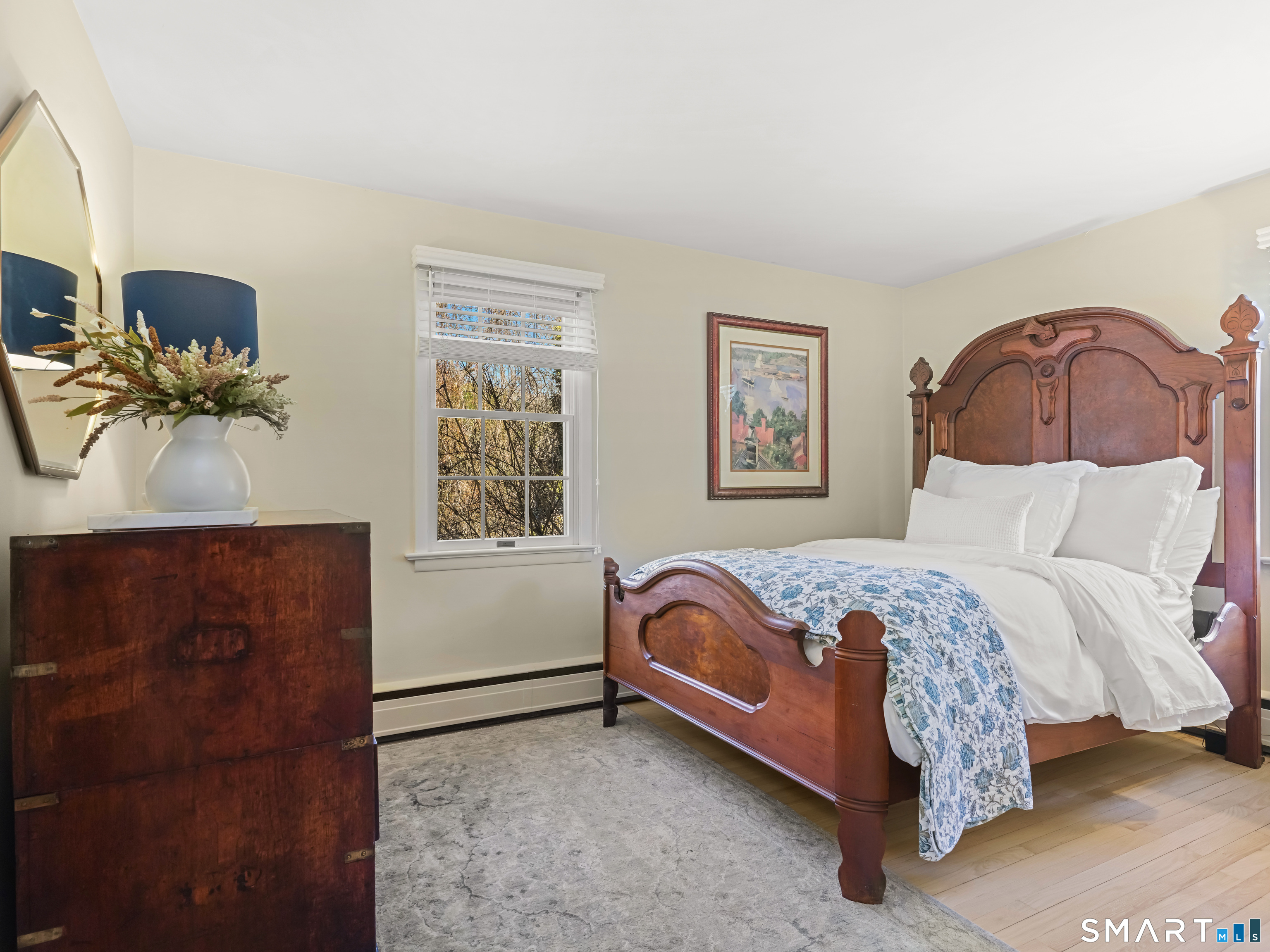 10 Reimer Road Westport, CT 06880 - Photo 24 of 38 a bedroom with a bed and a dresser