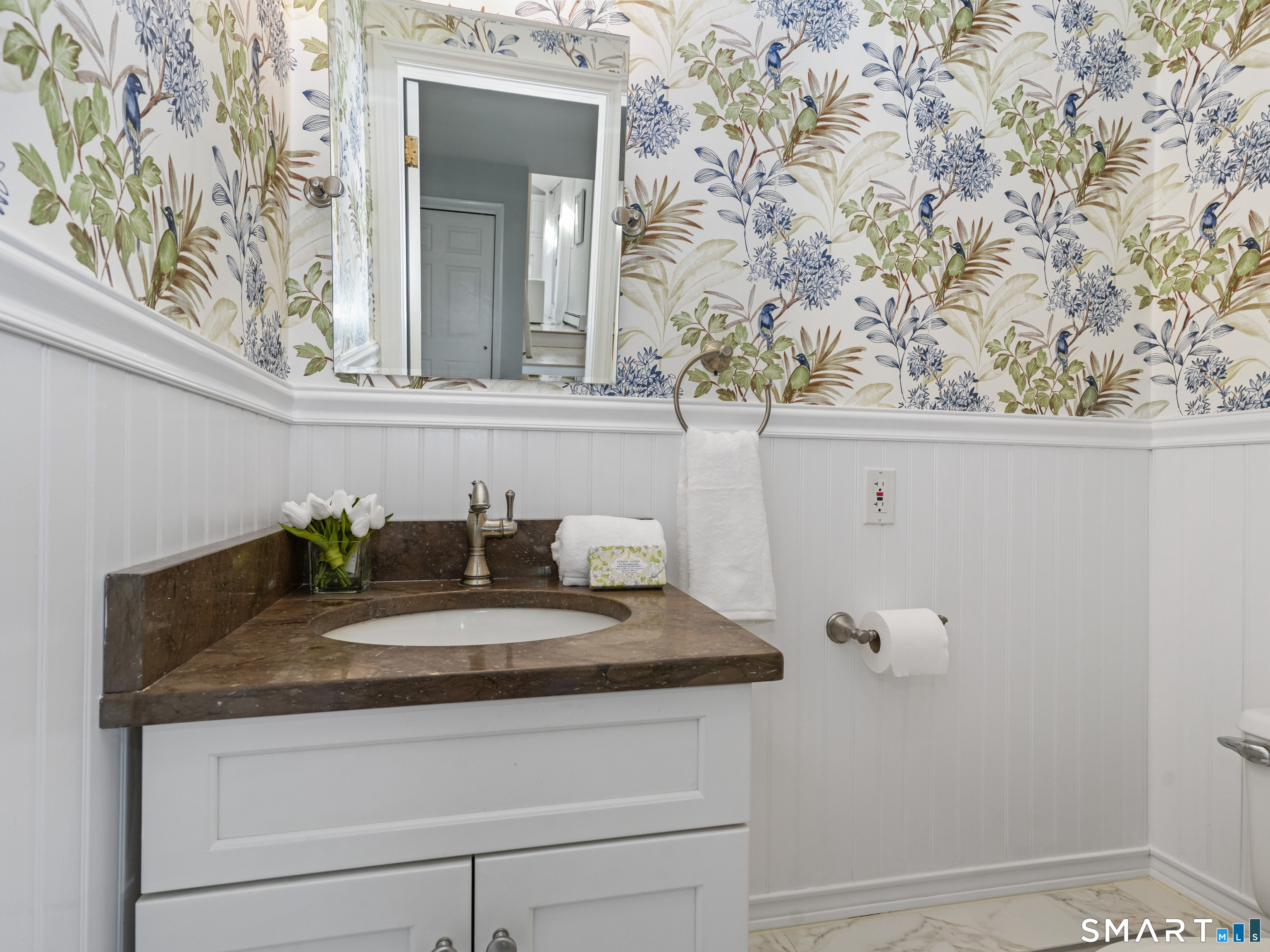 10 Reimer Road Westport, CT 06880 - Photo 27 of 38 a bathroom with a sink and mirror