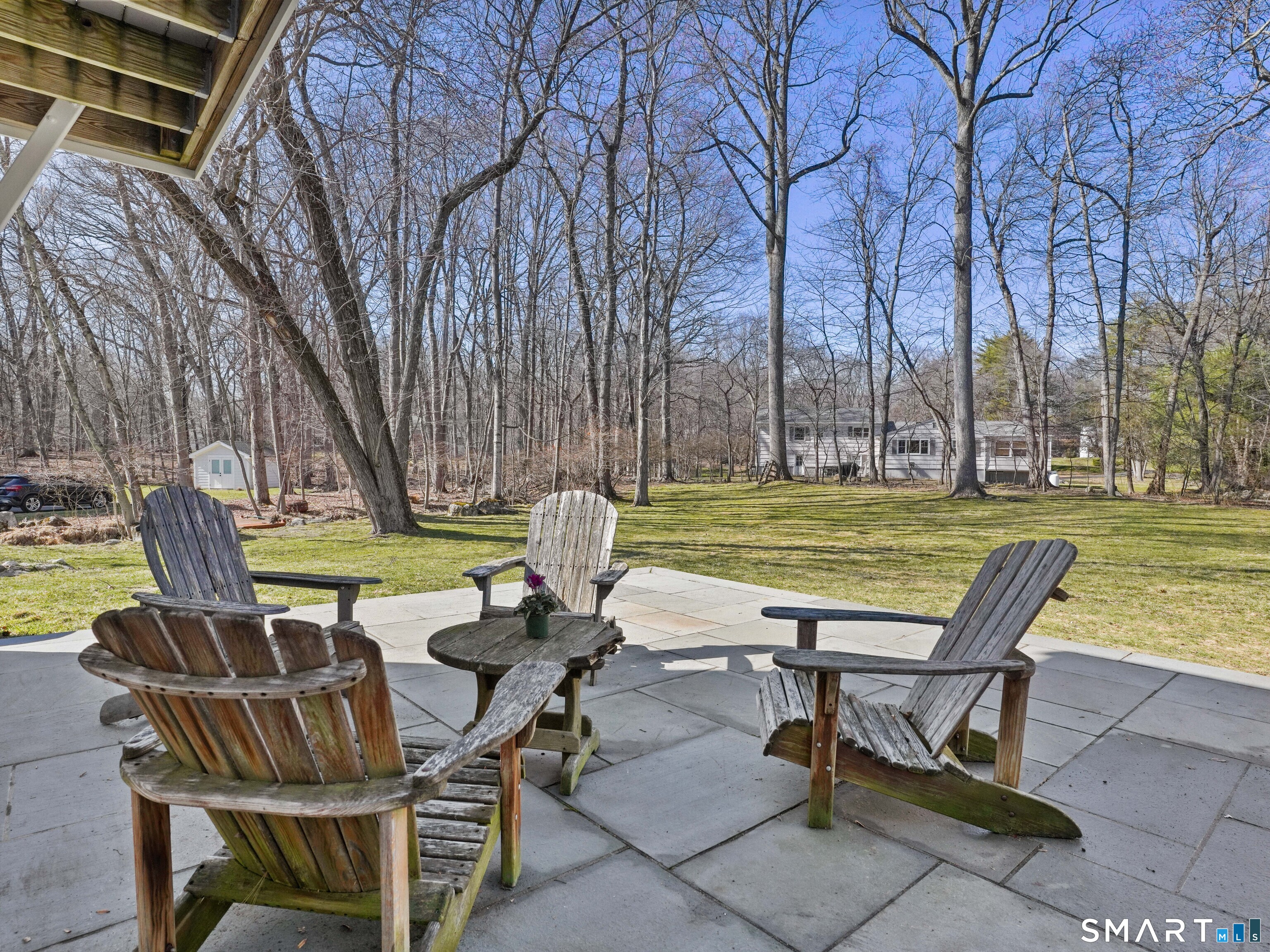 10 Reimer Road Westport, CT 06880 - Photo 30 of 38 a view of a swimming pool with lounge chairs in back yard of the house