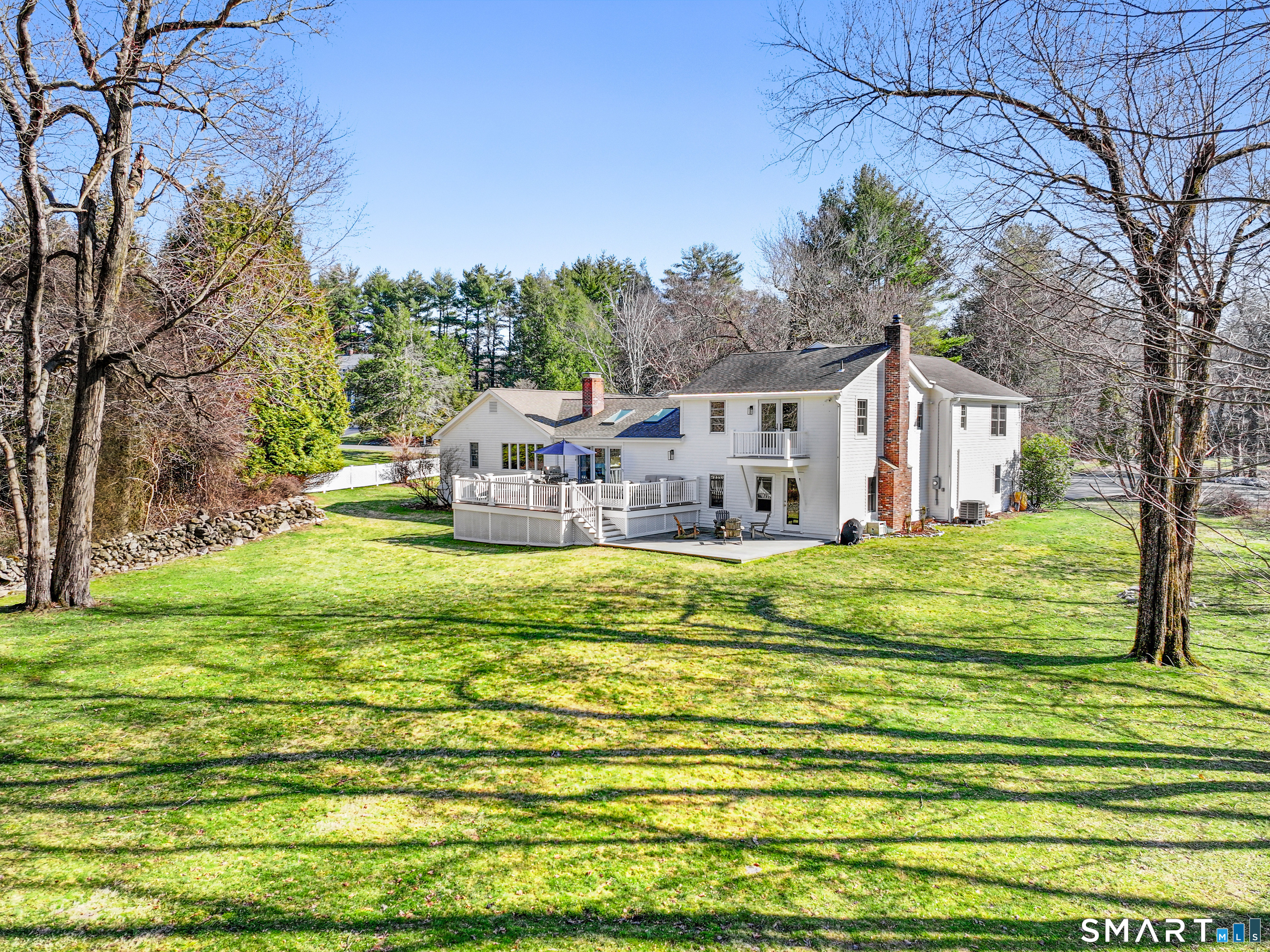 10 Reimer Road Westport, CT 06880 - Photo 33 of 38 a house view with a swimming pool
