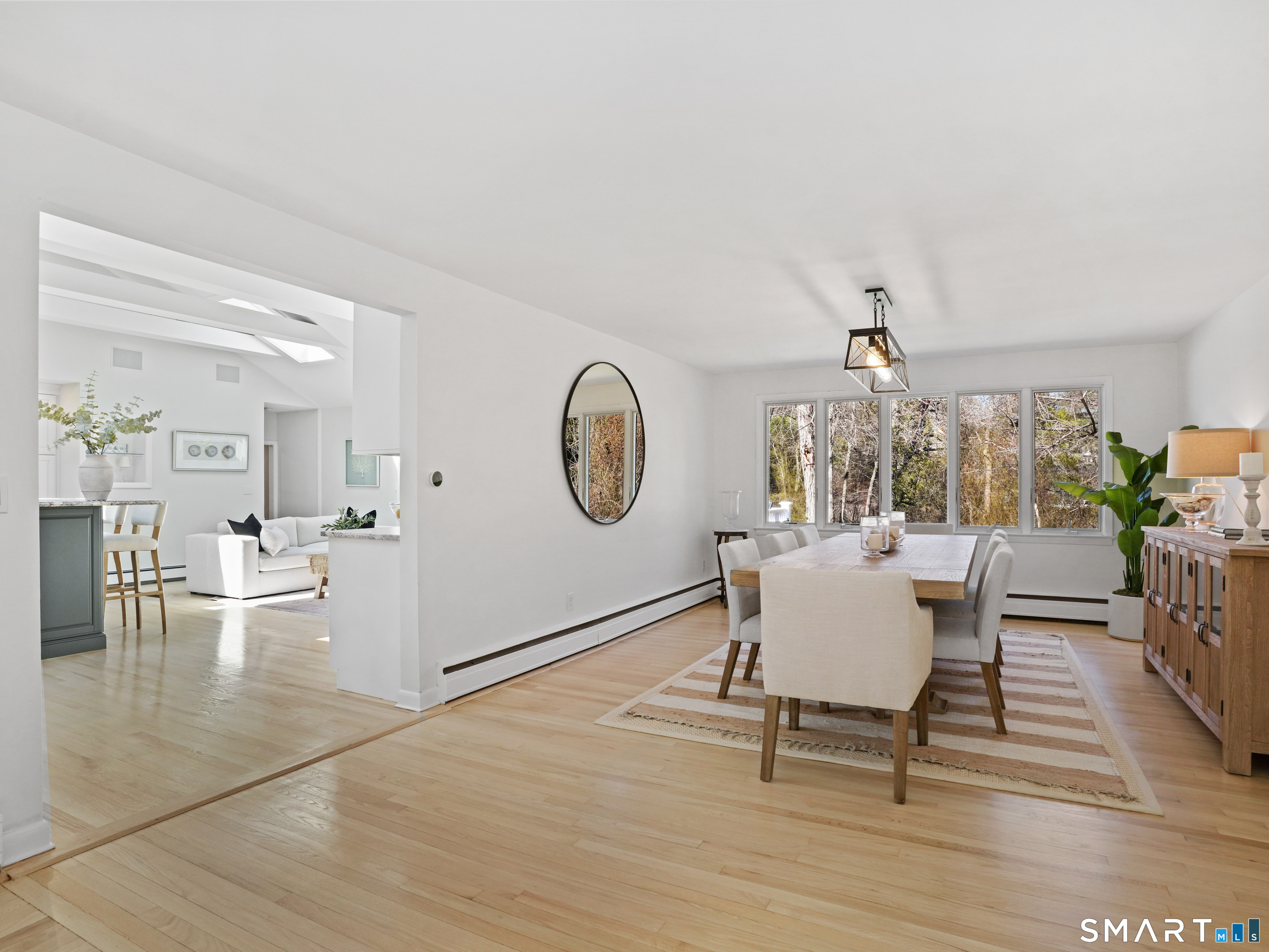 10 Reimer Road Westport, CT 06880 - Photo 7 of 38 a living room with furniture a rug and a clock