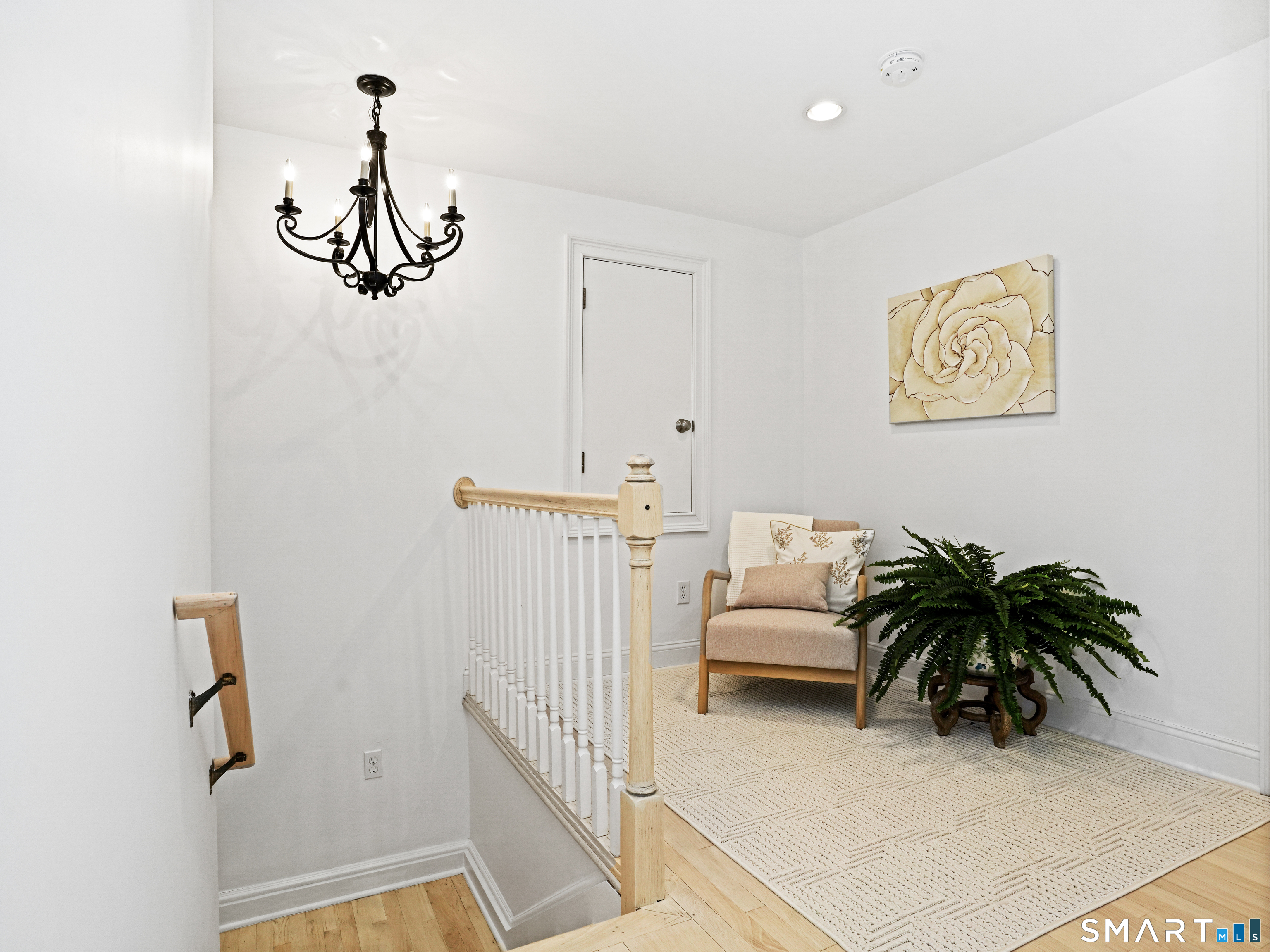 10 Reimer Road Westport, CT 06880 - Photo 9 of 38 a living room with furniture and a potted plant