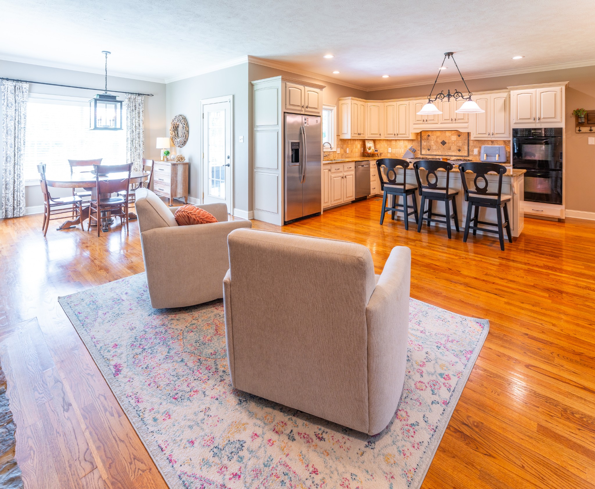 1015 Kelly Road Dyersburg, TN 38024 - Photo 19 of 41 a living room with furniture a dining table and a large window