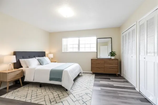 a view of room with wooden floor