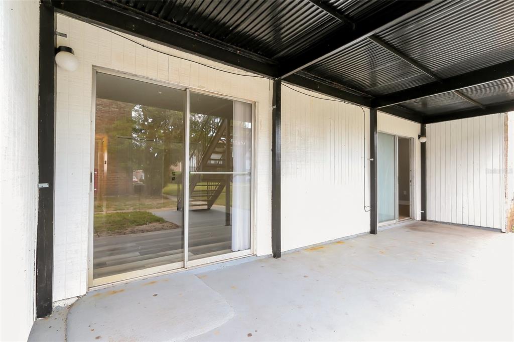 5317 Curry Ford Road, Unit J102 Orlando, FL 32812 - Photo 22 of 24 a view of backyard