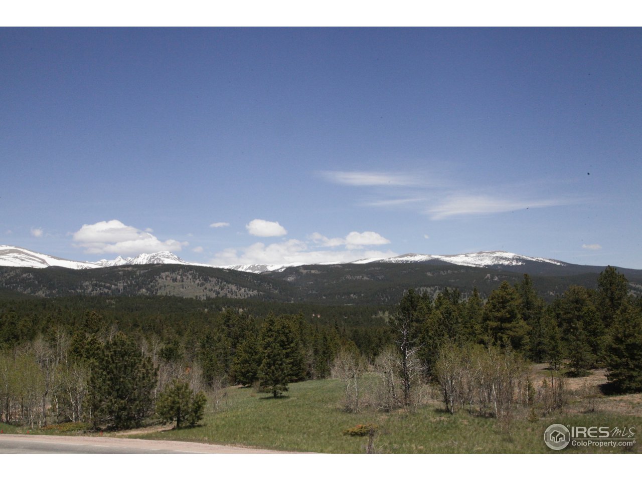 99 Ridge Road Nederland, CO 80466 - Photo 2 of 27 a view of mountain with sunset