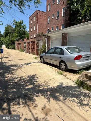 a view of parking area of a building