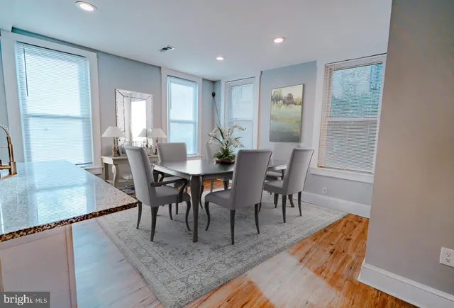 a view of a dining room with furniture