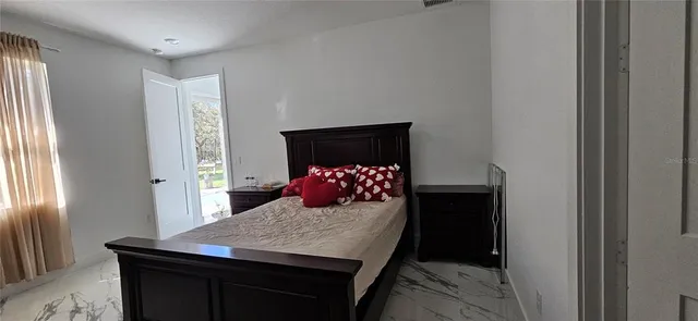 a table room with a table and chairs