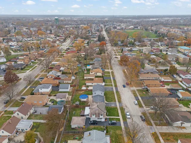 an aerial view of a city with lots of residential buildings