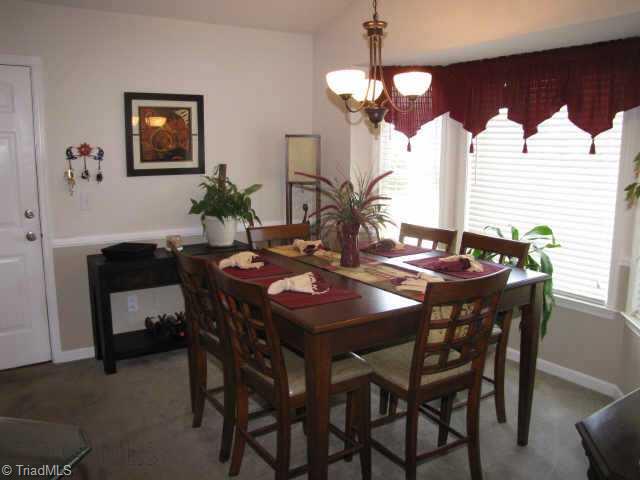 5702 Broadleaf Road Summerfield, NC 27358 - Photo 3 of 9 Other. Dining room with bay window
