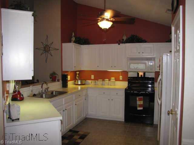 5702 Broadleaf Road Summerfield, NC 27358 - Photo 4 of 9 Other. Fabulous kitchen with loads of cabinets and counterspace. Under cabinet lighting