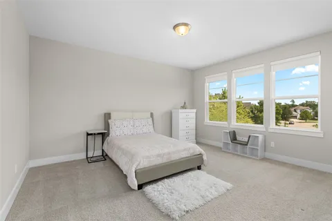 a living room with a couch and a table