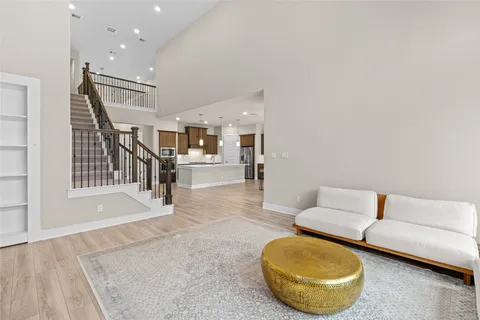 an aerial view of a house with a swimming pool