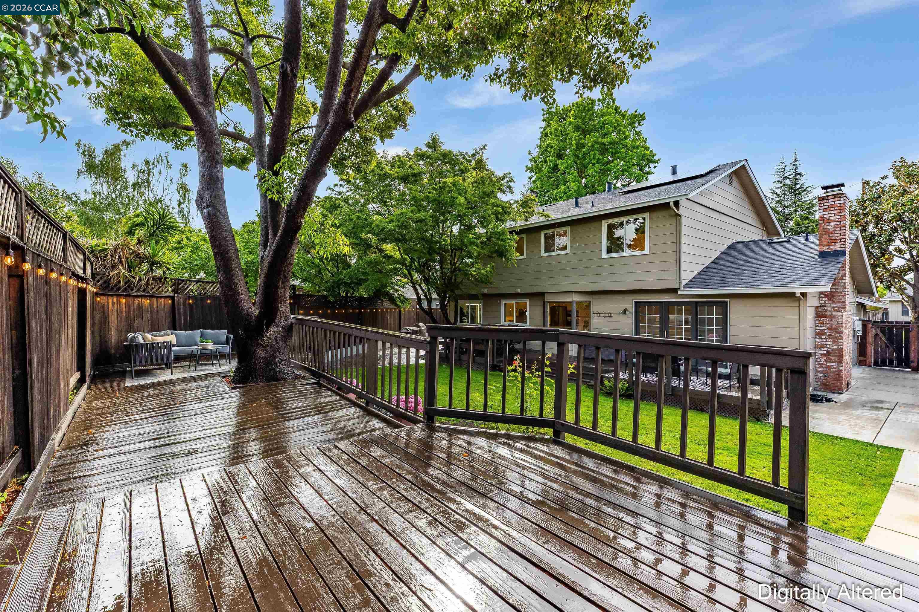 418 Devon Court San Ramon, CA 94583 - Photo 47 of 62 a view of a wooden deck with large trees and wooden fence