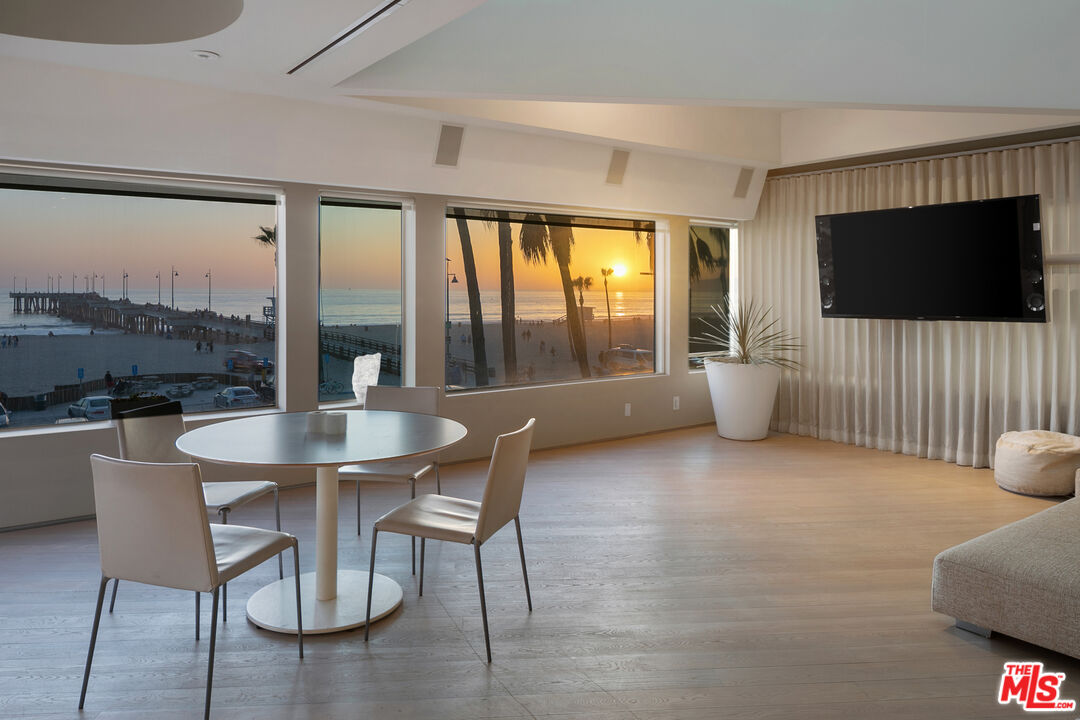 3111 Ocean Front Walk Marina del Rey, CA 90292 - Photo 15 of 17 a living room with furniture and a flat screen tv