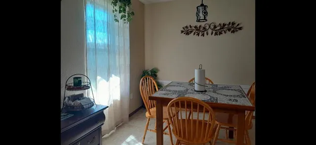 a view of balcony with furniture