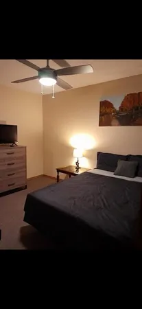 a view of bedroom with a bed