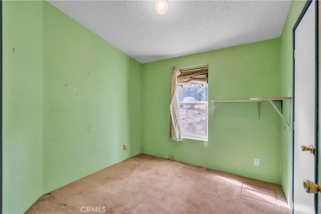 a view of a room that has window in it