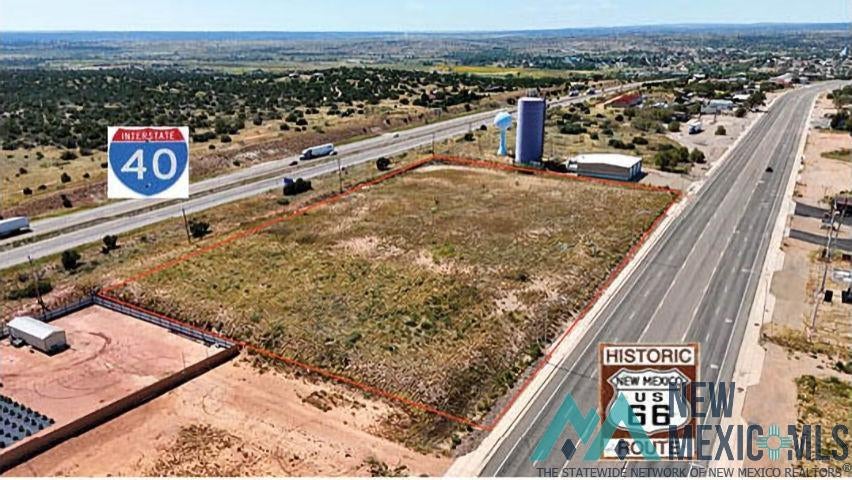 2390 Historic Route 66 Route Santa Rosa, NM 88435 - Photo 1 of 7 Aerial view of property and surrounding area with property parcel outlined