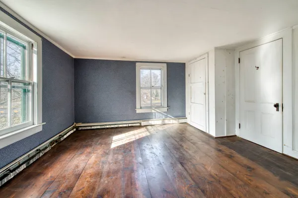an empty room with windows